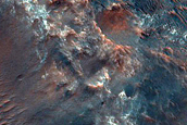 Possible Phyllosilicate-Rich Terrain in Crater near Her Desher Vallis