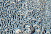 Variety of Surfaces in Terra Sirenum