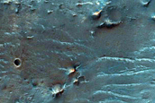 Tyrrhena Terra Crater Ejecta with Hydrated Minerals