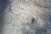 Slopes of Chaotic Terrain in Ancient Crater