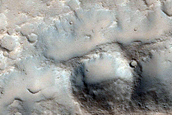 Crater East of Hecates Tholus