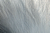 Monitor Mid-Latitude Crater with Steep Slopes
