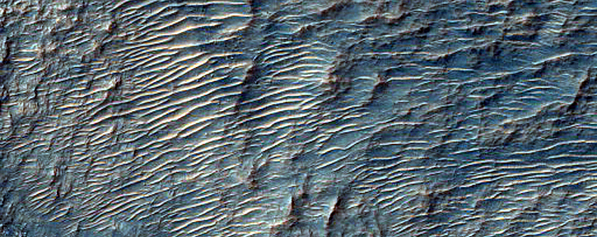 Banded Olivine-Rich Massif in Northeast Hellas Planitia