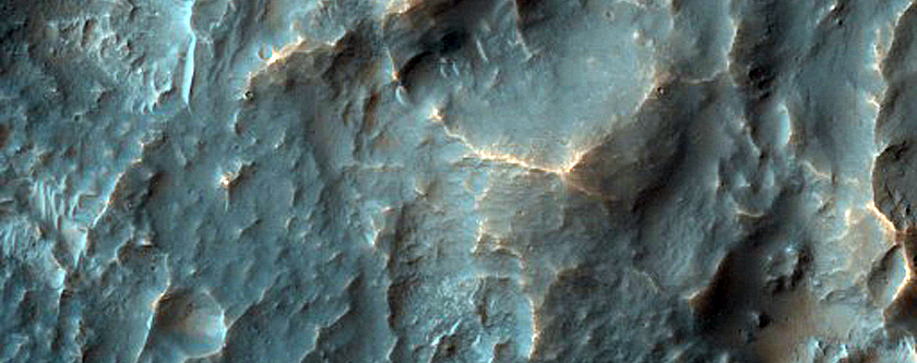 Crater in Crater Exposing Bedrock