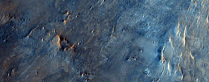Phyllosilicate-Rich Terrain adjacent to Toro Crater