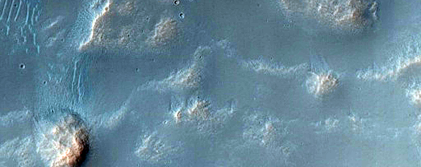 Possible Pingos in Crater in Melas Fossae
