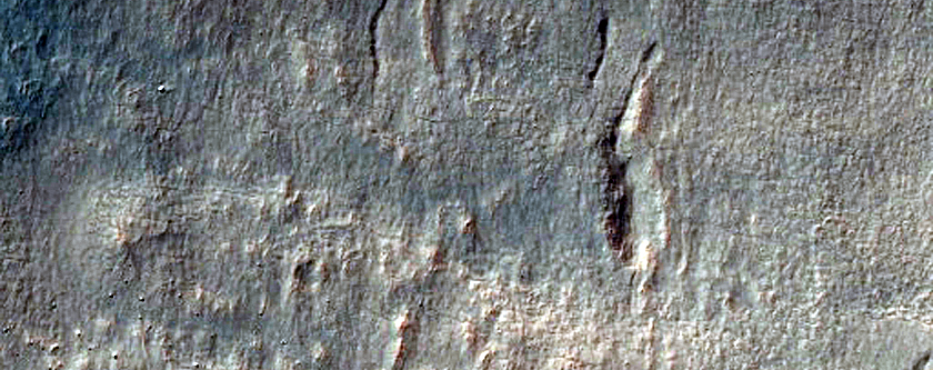Gullies in 15-Kilometer Diameter Crater in Thaumasia Region