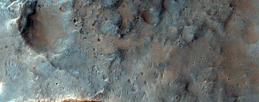 Possible Phyllosilicates Associated with Small Crater in Tyrrhena Terra