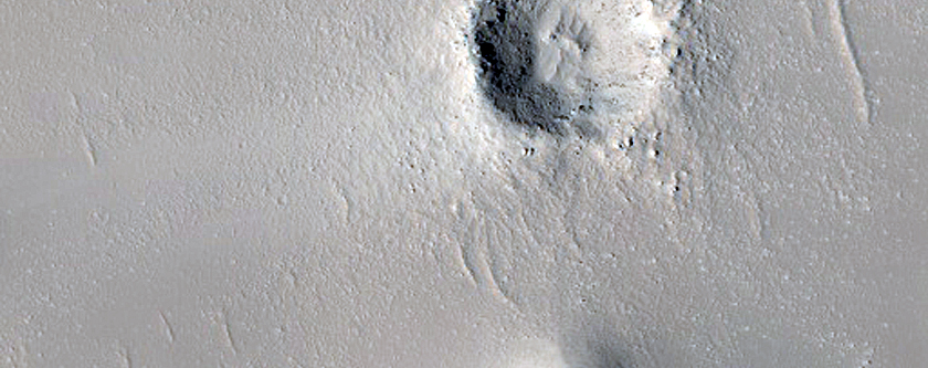 Fresh Impact Exposing Bedrock in Arabia Terra