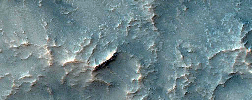 Possible Hydrated Materials around Solis Planum Impact Crater