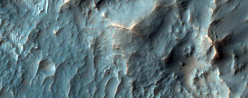 Crater in Crater Exposing Bedrock