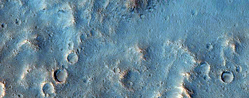 Impact Craters Exposing Bedrock