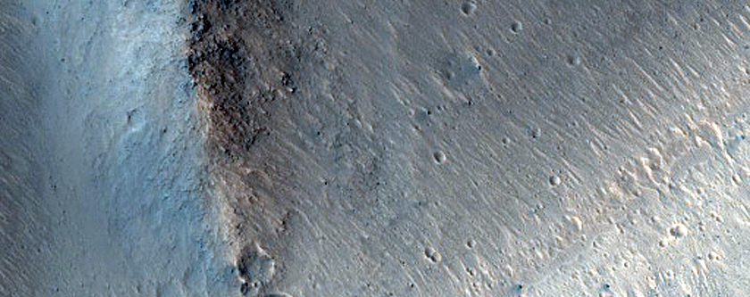 Landslides in Orson Welles Crater