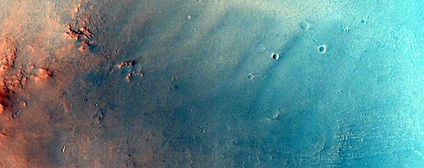 Possible Olivine Exposed by Impact Crater in Northeast Syrtis Major Region