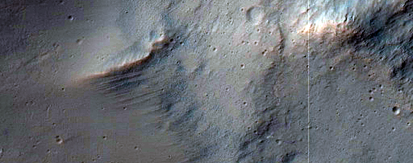 A 14-Kilometer Impact Crater with Central Pit in Terra Cimmeria