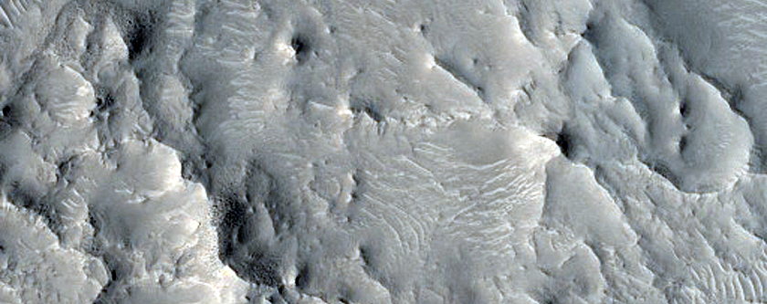 Layers near Crater Rim West of Auqakuh Vallis