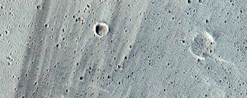 New Impact Crater Northwest of Ceraunius Tholus