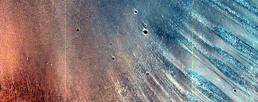 Olivine-Rich Terrain Exposed by Impact Crater in Northeast Syrtis Major