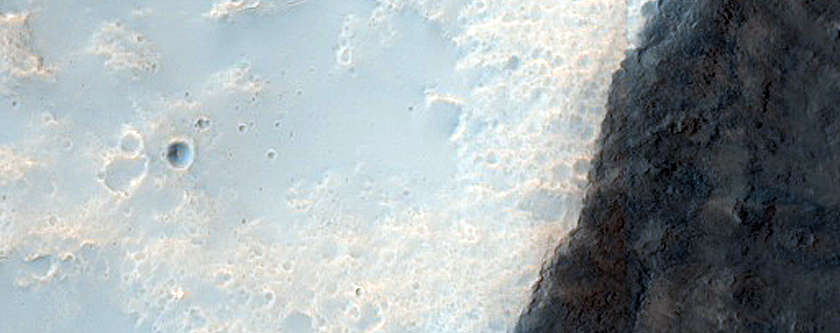 Channel with Fresh Crater in Tyrrhena Terra