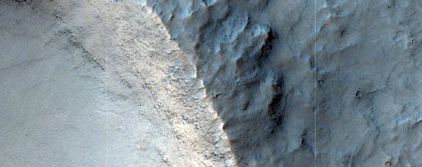 Possible Mafic Mineral Exposures around Crater in Solis Planum