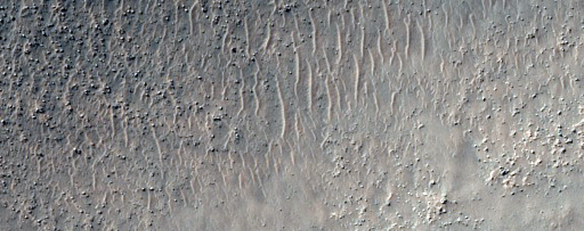 Icaria Fossae Crossing Crater