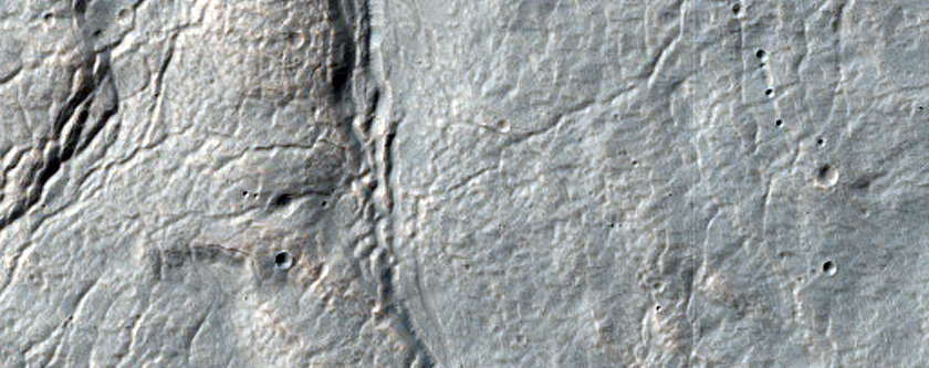 Cracks in Upper Plains Unit in Centauri Montes