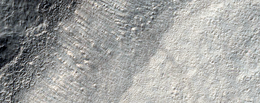 Straight Ridges Running Down Wall along Reull Vallis