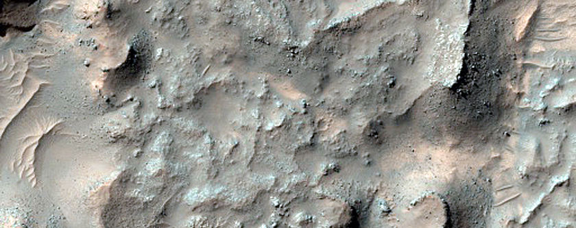 Bright Materials on Rocky Lampland Crater Floor