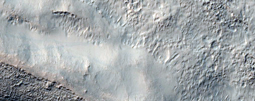 Possible Olivine Exposed around Crater in Terra Sirenum