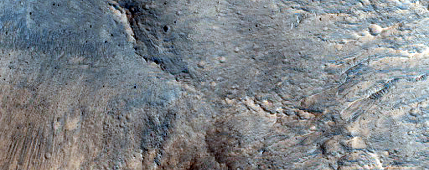 Ejecta of Central Peak-Pit Crater