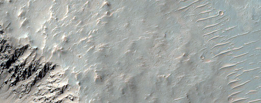 Eastern Rim Wall Exposed in 2-Kilometer Crater