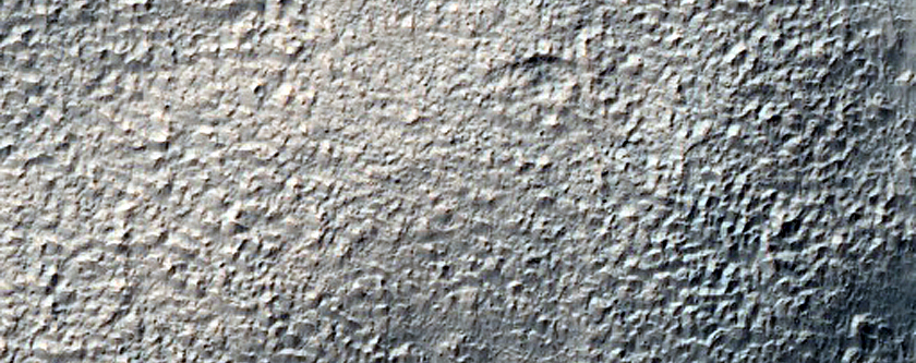 Small Channels Converging above Large Crater