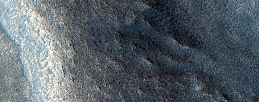 Dipping Layers in Crater near Mamers Valles
