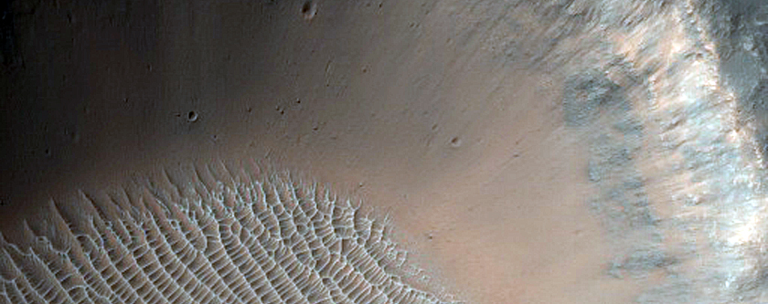 Possible Phyllosilicates Associated with Small Crater in Tyrrhena Terra
