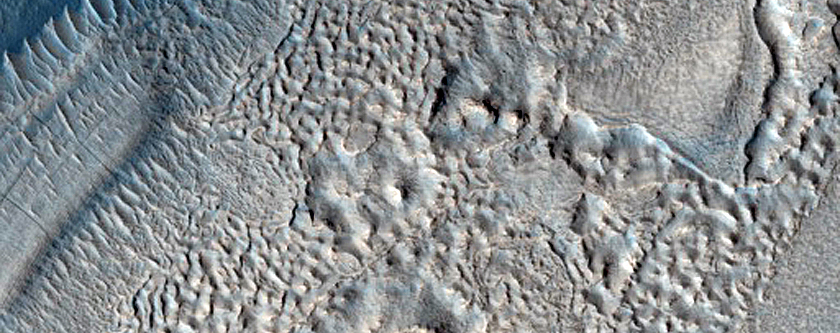 Dipping Layers along Mesa in Deuteronilus Mensae