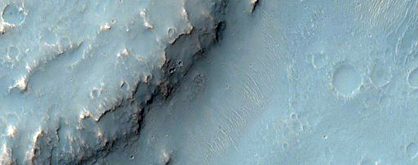 Channels Intersecting Crater in Xanthe Terra