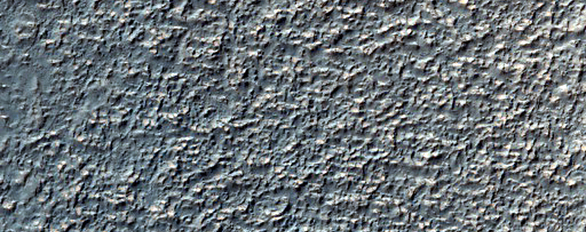 Crater Ejecta and Channel in Southern Mid-Latitudes
