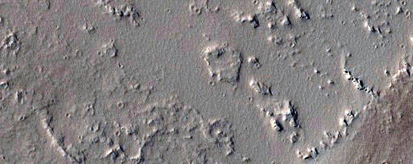 Fossae East of Pavonis Mons