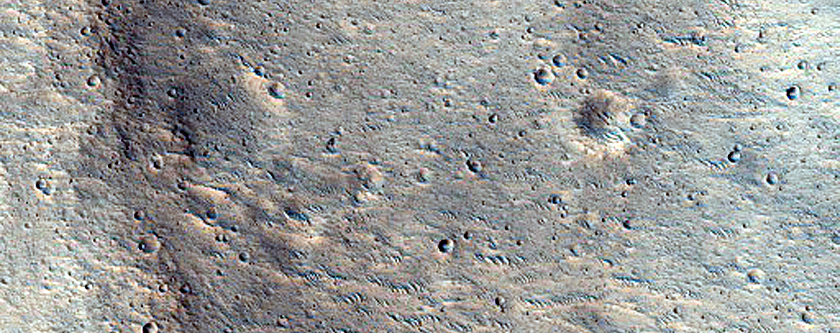 Impact-Related Deposits and Flows East of Shalbatana Vallis
