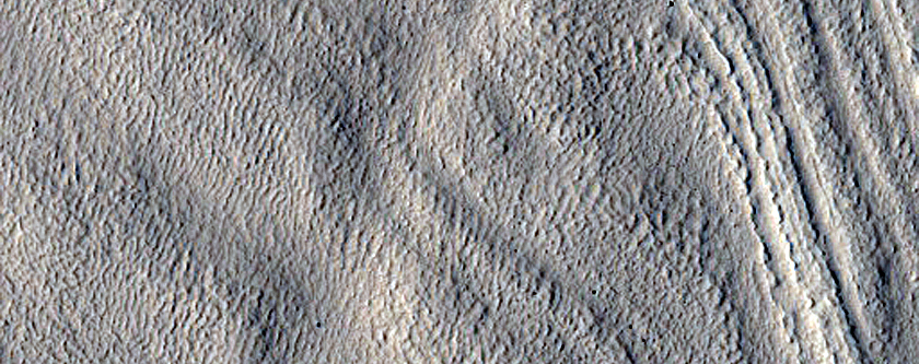 Surface Bands on Lobate Debris Apron with High Sinuosity
