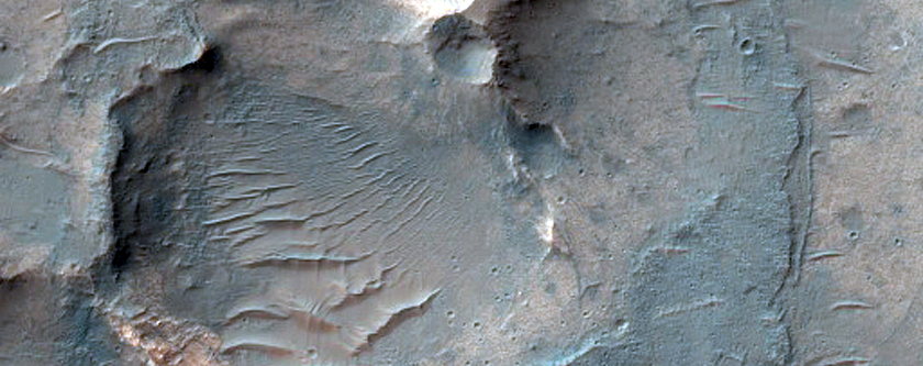Crater East of Thaumasia Planum