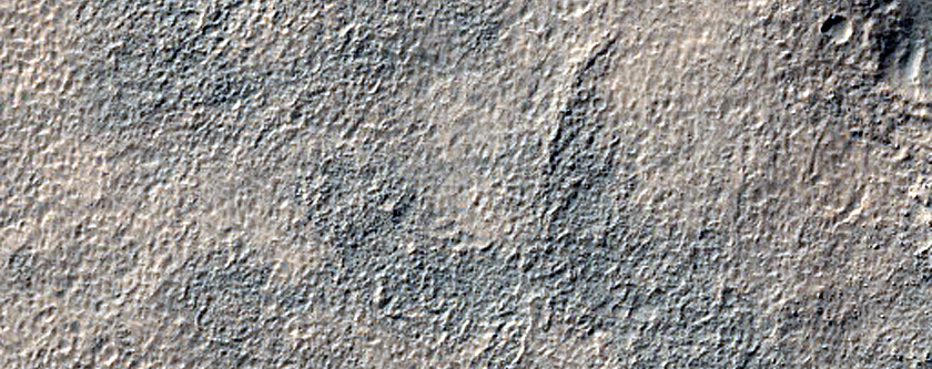 Layered Features near Arrhenius Crater