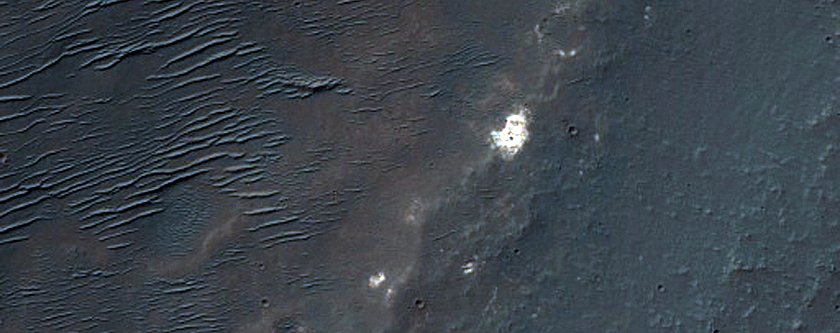 Bright Patches near Aniak Crater