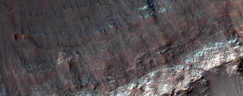 Crater Exposing Bedrock