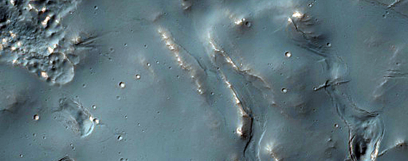 Bright Deposits near Voeykov Crater