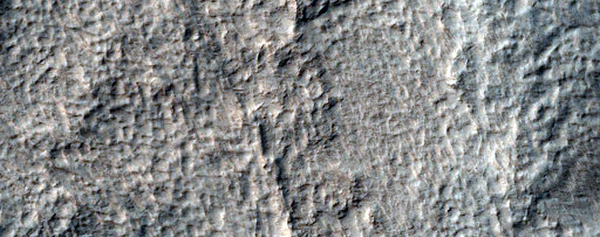 Ridges and Layers near Dao Vallis