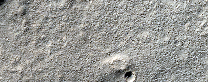 Layered Deposits in Craters in Promethei Terra