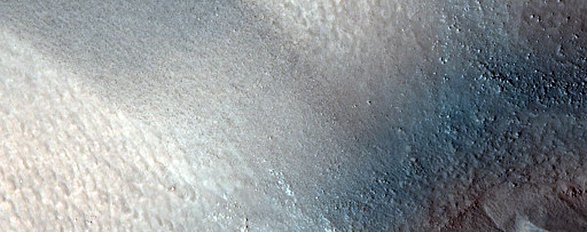Possible Gully Associated Light-Toned Materials near Acidalia Planitia