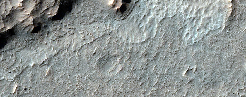 Outcrops South of Columbus Crater in Terra Sirenum