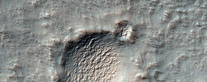Possible Olivine-Rich Bedrock on Crater Southeast of Cross Crater